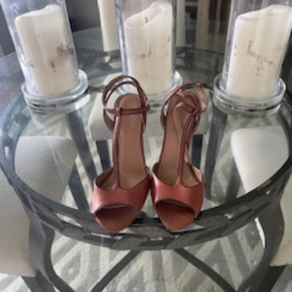Rust Colored strappy high heeled sandle. Never worn